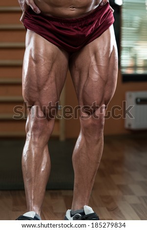 Close-Up of Bodybuilders Legs Ready For Competitive Sport