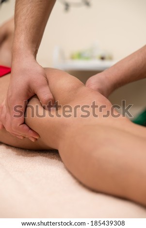 Leg Massage - Handsome Young Man Enjoying At The Spa Center
