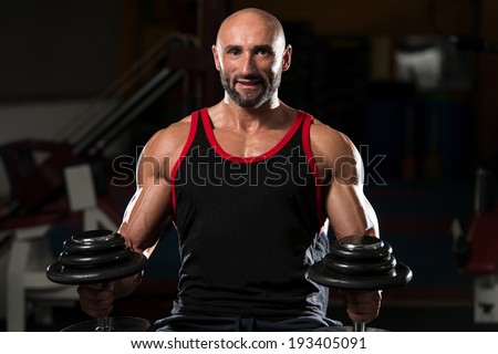 Portrait Of A Physically Fit Mature Man In A Healthy Club