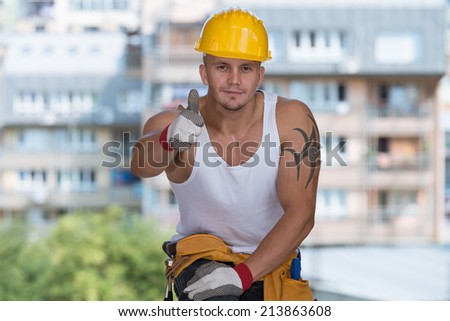 Happy Caucasian Construction Worker Giving Thumb Up