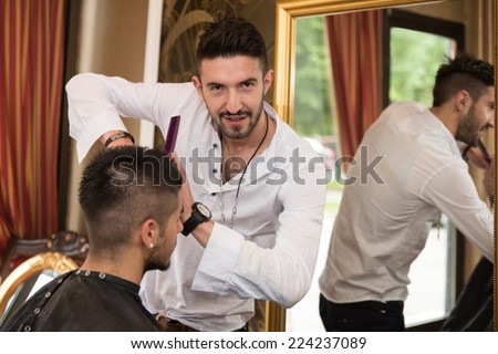 Professional Hairdresser With Short Hair Model - Handsome Young Hairdresser Giving A New Haircut To Male Customer At Parlor