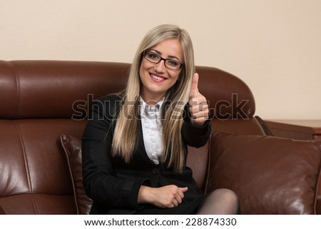 Happy Smiling Cheerful Business Woman With Thumbs Up Gesture