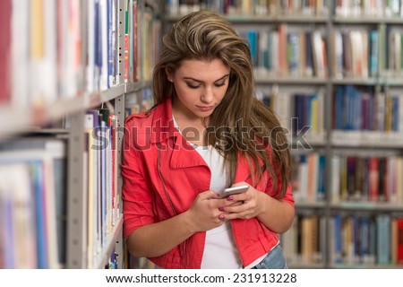 Student Happy With Online Learning Study By E-Learning Content Technology With Mobile Phone - Shallow Depth Of Field