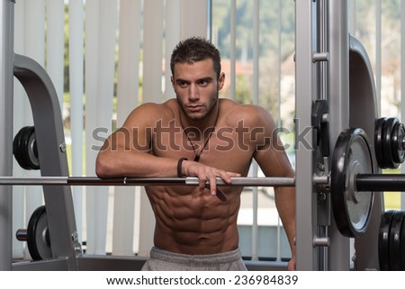 Portrait Of A Physically Fit Young Man In A Healthy Club