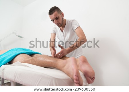 Masseur Doing Massage On Man Body In The Spa Salon