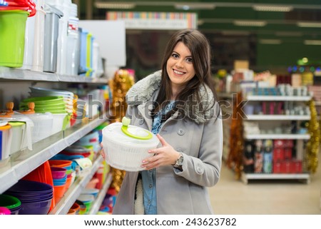Beautiful Young Woman Shopping For Bowl In Produce Department Of A Grocery Store - Supermarket - Shallow Deep Of Field