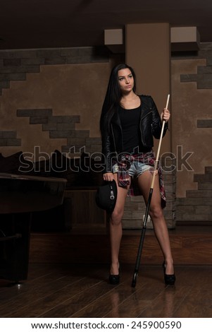 Portrait Of A Sexy Woman Playing Billiards