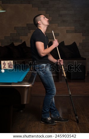 Young Man Looking Confused Lost His Billiard Game