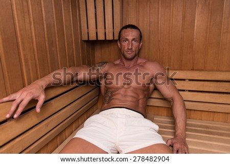 Good Looking And Attractive Mature Man With Muscular Body Relaxing In Sauna Hot