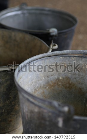 three old tin rusty metal vintage buckets