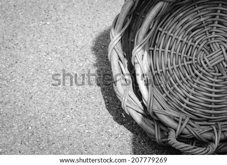 Two empty wicker baskets on the street