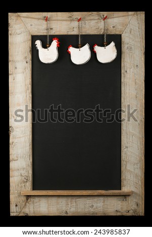 Vintage Easter chicken roosters with red hearts chalkboard blackboard in reclaimed old wooden frame isolated on black with copy space
