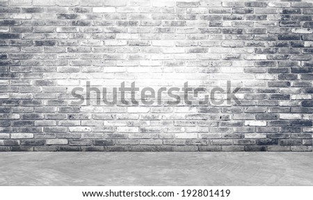 Empty brick wall and cement floor room in perspective.