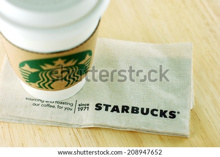 BANGKOK THAILAND August 3 2014 A cup of Starbucks coffee Starbucks is the world's largest coffee house with over 20 000 stores in 61 countries BANGKOK THAILAND August 3 2014 A cup of Starbucks coffee Starbucks is the world's largest coffee house with over 20 000 stores in 61 countries