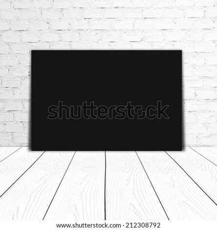 Blank black poster and white brick wall background, template
