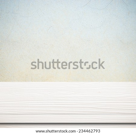 Empty white wooden table over grunge cement wall, vintage, background, template, display