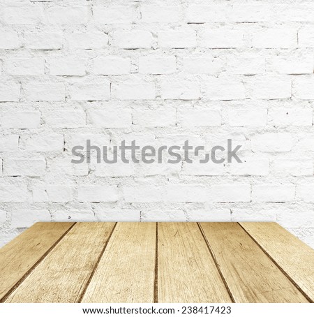 Empty wooden table over white brick wall, vintage, background, template, display