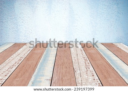 Empty vintage wood table over blue cement wall, vintage, background, template, display