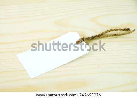 White paper tag on wood