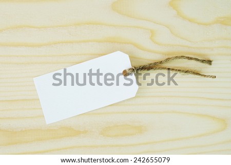 White paper tag on wood