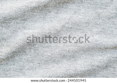 Wrinkled gray cotton polyester texture, detailed closeup, rustic crumpled vintage fabric.