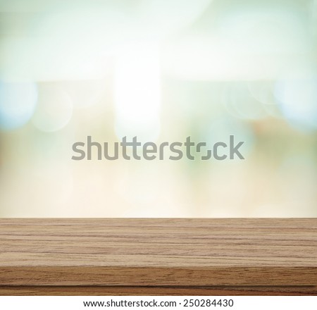 Empty table and blurred store with bokeh background, product display template.