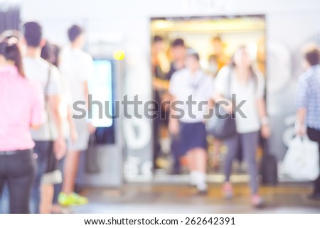 Blur crowded subway passengers background, transportation
