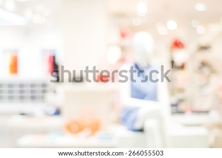 Blur window shopping display at mall with bokeh light background, retail business concept