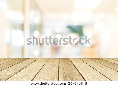 Perspective wood and blurred store with bokeh background, product display montage