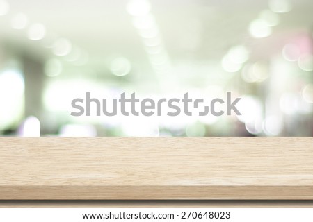 Empty table and blurred store bokeh background, product display montage