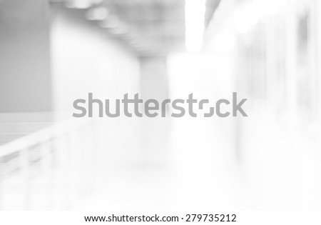 Blur inside office building with bokeh light background, interior and business background