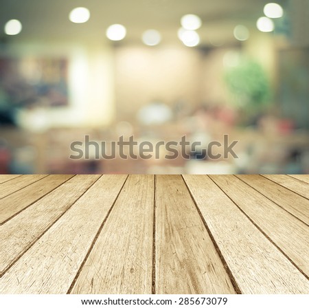 Perspective wood over blurred restaurant with bokeh background, foods and drinks, product display montage