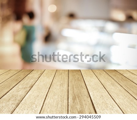 Perspective wood and blurred store with bokeh background, Product display template