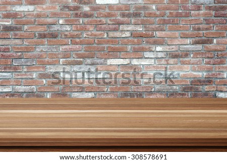 Empty wooden table over brick wall, vintage, background, template, product display