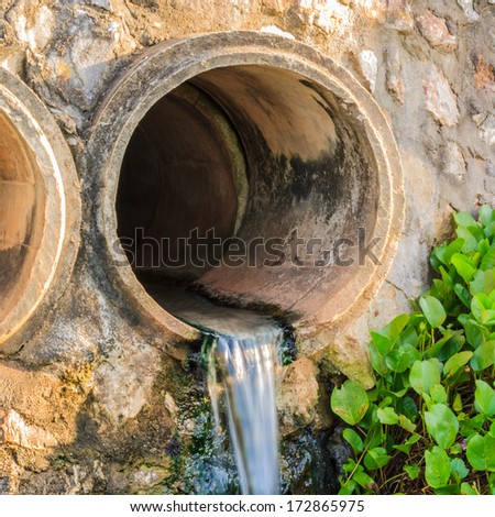 waste pipe or drainage polluting environment. concrete pipe.