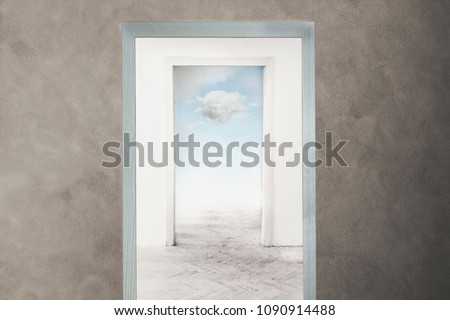conceptual image of a door that opens towards freedom and dreams