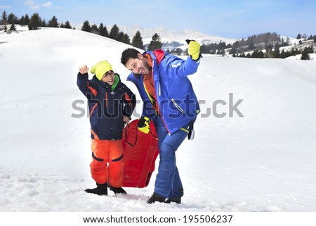 father and son having fun in mountain
