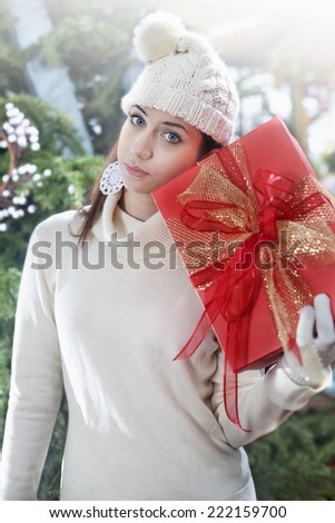 sad woman with gift box