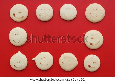 many face on cookies are on red background