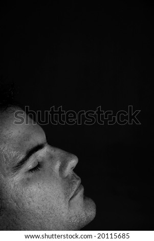 man\'s face in black and white