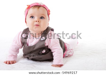 baby girl pictures. stock photo : A aby girl is