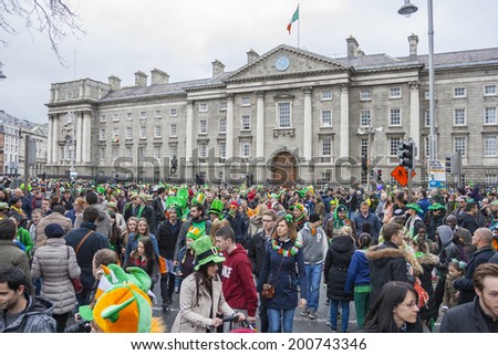 DUBLIN, IRELAND - MARCH 17: Saint Patrick\'s Day parade in Dublin, Ireland. On March 17, 2014. People dress up Saint Patrick\'s Day at Trinity College on Dame Street