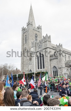DUBLIN, IRELAND - MARCH 17: Saint Patrick\'s Day parade in Dublin, Ireland. On March 17, 2014. People dress up Saint Patrick\'s Day at St. Patrick\'s Cathedral