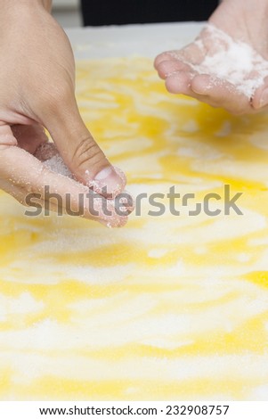 Adding sugar as ingredient to make dessert