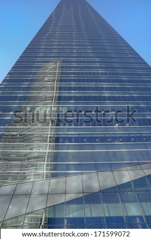 MADRID, SPAIN - DECEMBER 26, 2013. Four Towers Business Area (CTBA) in Madrid, Spain. The photo shows one of the four towers; Glass Tower, designed by Argentine architect Cesar Pelli.