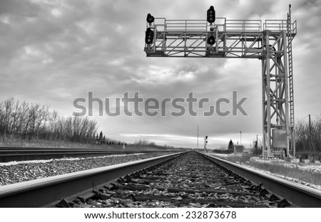 Industrial overhead steel railway lights in black and white