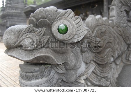 Dragon statue with green eye