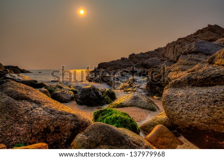 This photo was shot on in the New Territories of Hong Kong at the beginning of the golden hour, long exposure depicting the calmness of the beach, water and sunshine. Title: Hong Kong Evening