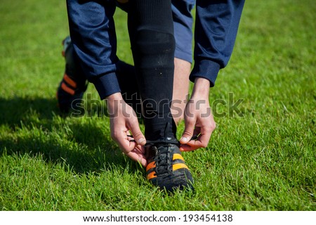 soccer player shooting at goal