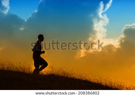 silhouette of a jogger in beautiful sunrise